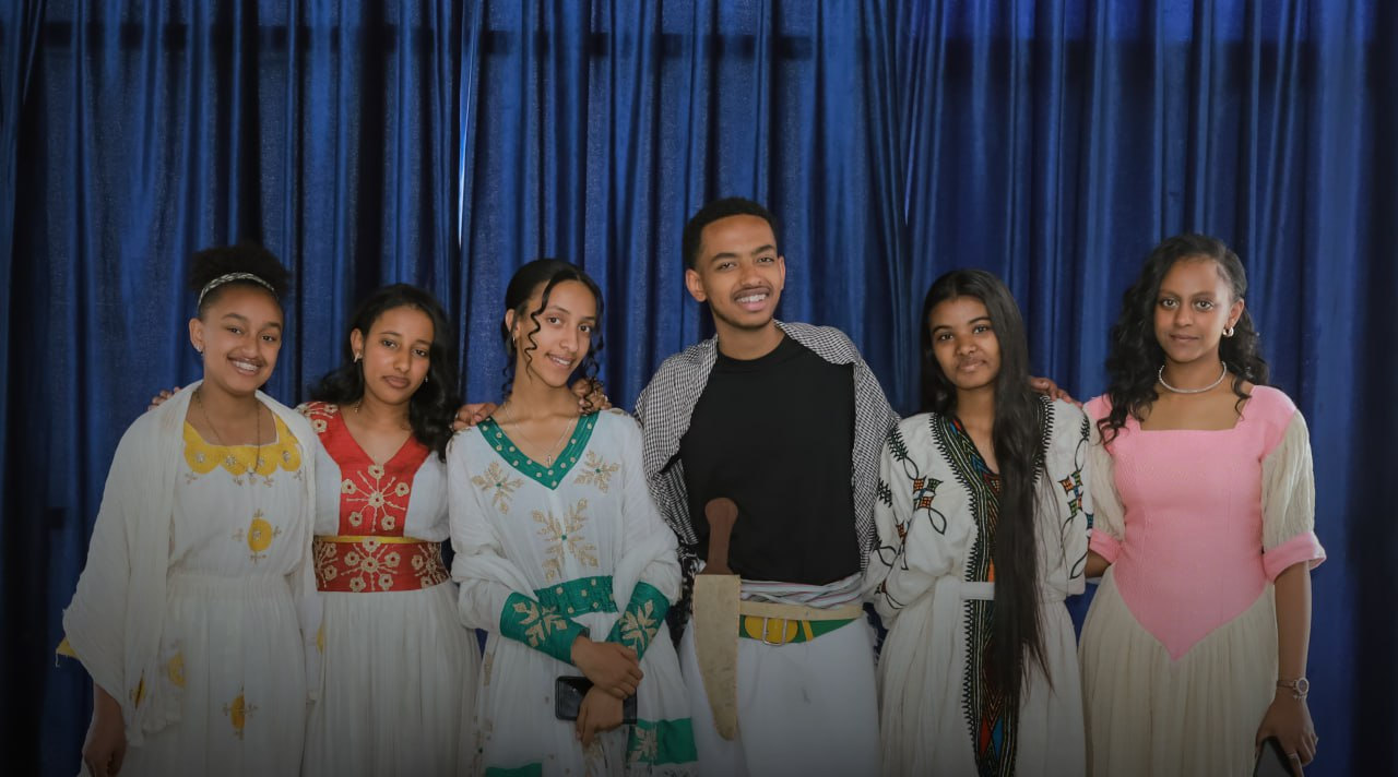 A group of students smiling together
