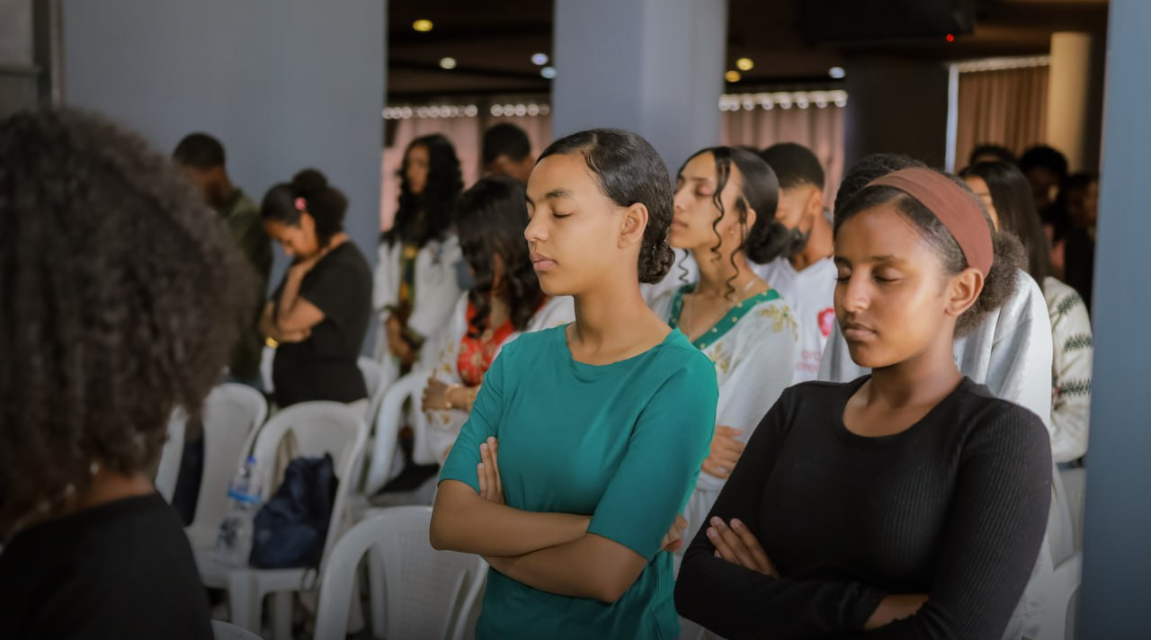 Students listening during the program